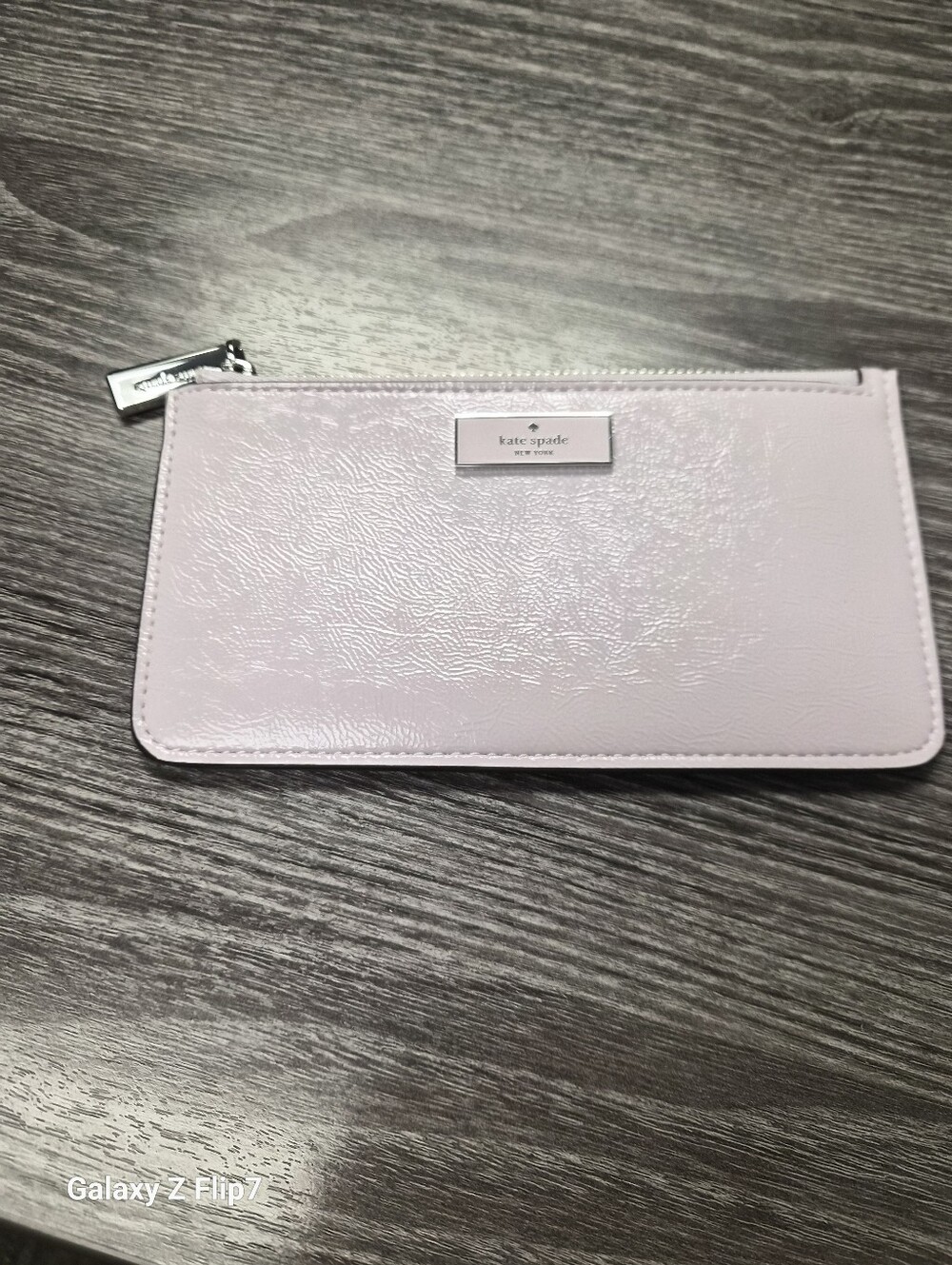 kate spade light Lavender patent leather zip pouch with silver logo